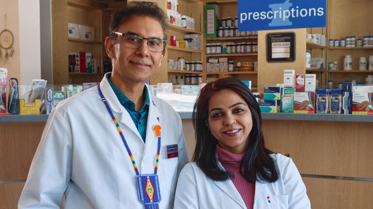 Portrait of Satya and Payal Joshi in the pharmacy.