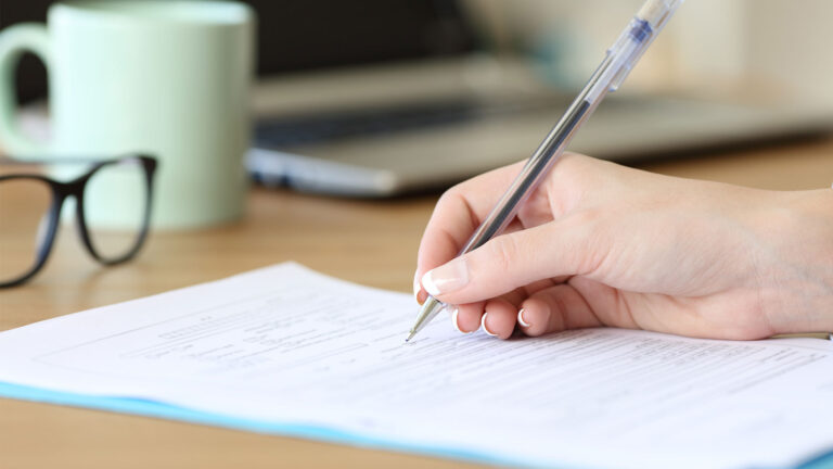 Closeup of person writing notes